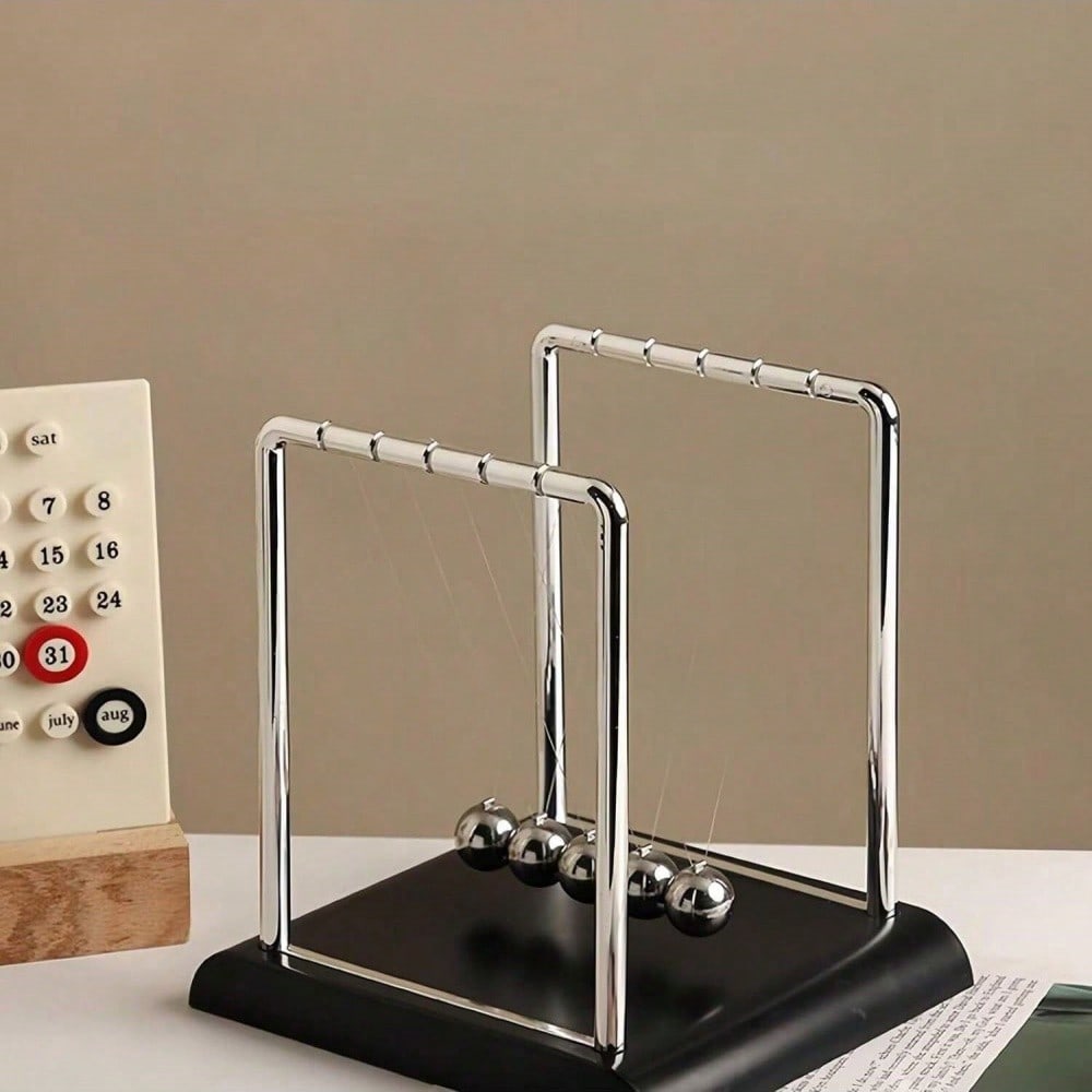 Black Metal Newton's Cradle Ba - مراجعة The Office Tech وسعره